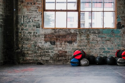 weight bags on the floor near wall